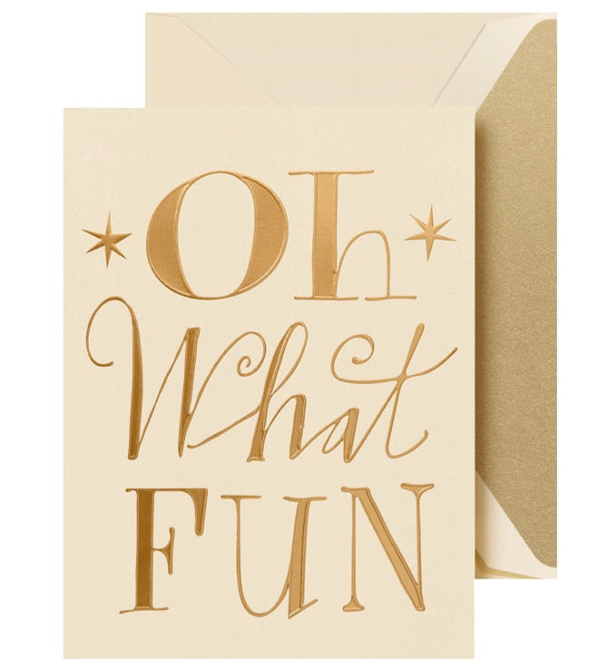The Crane Oh What Fun Card Set features cream-colored cards with gold foil "Oh What Fun" text and matching gold envelopes—perfect for sharing holiday cheer.