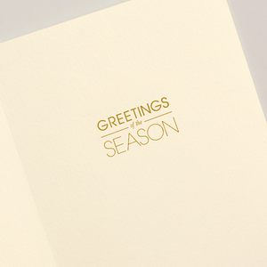 The Oh What Fun Card Set by Crane features an open cream-colored holiday card with "GREETINGS of the SEASON" elegantly printed in gold on the right—perfect for sending festive cheer.