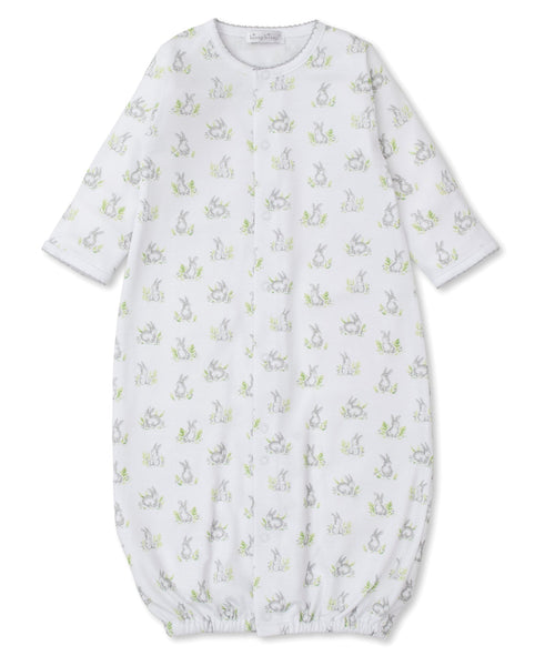 White baby sleep sack made of Pima cotton, featuring a Kissy Kissy Cottontail Print on a plain background.