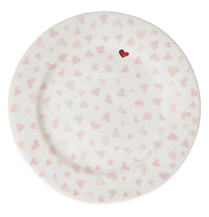 The Juliska Love You More Dessert/Salad Plate features a white ceramic design with pink hearts and a standout red heart near the rim, adding charming detail to your table setting.