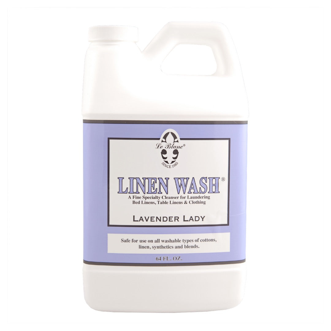 Le Blanc Linen Wash, Lavender Lady scent, in a 64 fl. oz. bottle—ideal for laundering luxury bed linens, table linens, and clothing, even with gentle cold water washes.