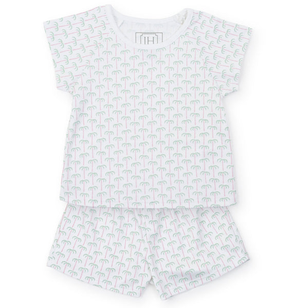 A white Lila and Hayes Girls' Emery Short Set with elephants and palm tree print.