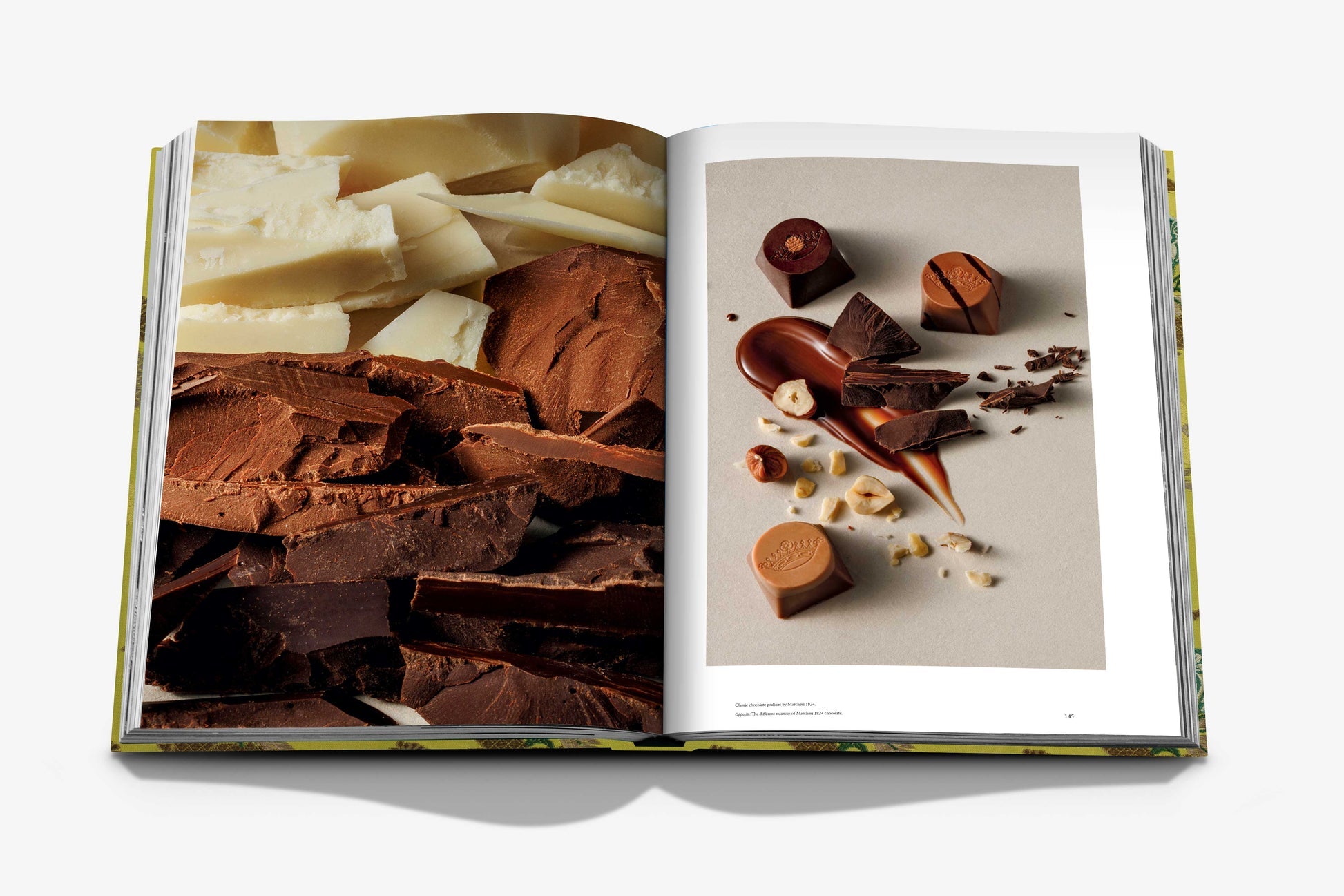 Open book reveals close-up images of assorted chocolates on the left and a luxurious spread of chocolate pieces and nuts on the right, resembling an Assouline Marchesi 1824 presentation.