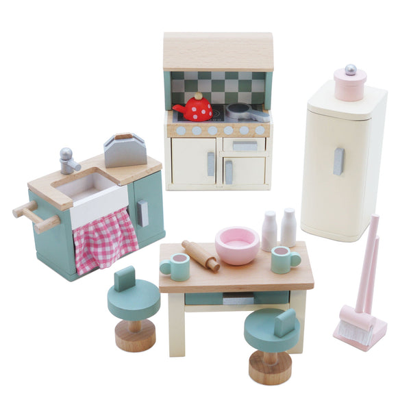 A kitchen furniture set with a refrigerator, oven and sink, perfect for small world play or dolls house.