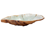 The Coffee Table Bowl Collection by AE Ceramics features a wide, shallow ceramic bowl with an earthy brown textured exterior and smooth light green glazed interior—an elegant centerpiece for any setting.