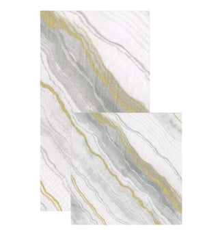 Two rectangular, biodegradable Caspari Marble Grey Collection napkins—one large triple-ply set behind a smaller one—feature an eco-friendly marble pattern with gray, white, and gold wavy lines.