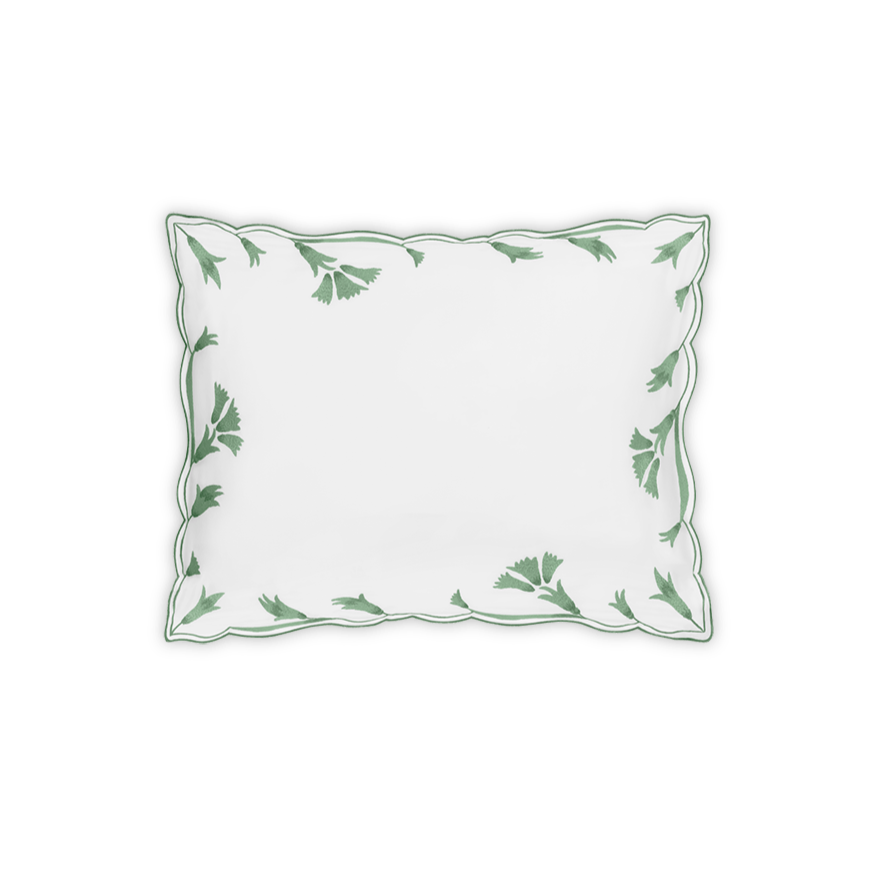 The Matouk Marcella Bedding Collection, Clover, features a white rectangular pillowcase adorned with scalloped florals and green leaf embroidery along the border—ideal for elevating your bedding ensemble.