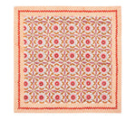 The Majorelle Napkin Set by Kim Seybert features a geometric floral pattern in red, pink, and orange with diagonal red borders, inspired by Indian block printing to add artisanal charm to your table.