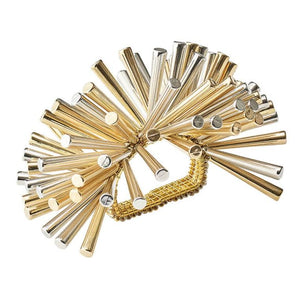 The Kim Seybert Fringe Napkin Ring features sculptural gold and silver rods with metal beads on a textured base, creating a glamorous and eye-catching table accent.