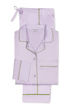 The Nocturne Pajama Set by Matouk features light purple Egyptian cotton pajamas with dark green piping—includes a long-sleeve shirt, pants, and matching drawstring pouch—crafted for luxurious leisurewear.