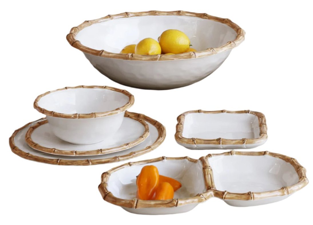 The Beatriz Ball Vida Natural Bamboo Serveware Collection offers break-resistant white melamine dishes with bamboo-style rims, including bowls, plates, and serving pieces—some adorned with lemons and peppers—for everyday elegance.