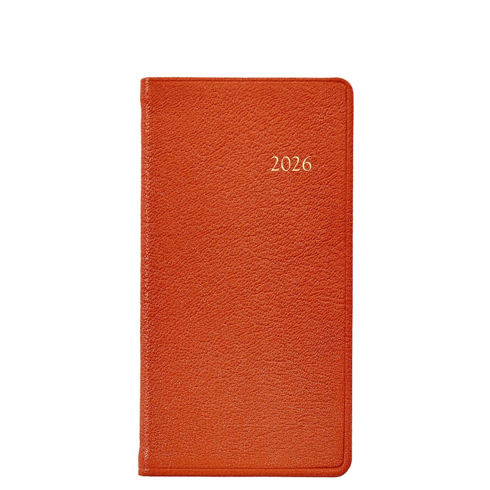 A red textured Graphic Image 2026 Pocket Journal Planner Collection diary with gold embossed numbers on the cover, shown on a white background.