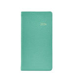 The 2026 Pocket Journal Planner Collection by Graphic Image features a teal textured hardcover pocket journal with "2026" gold-embossed on the front, Smyth sewn for durability, displayed against a white background.