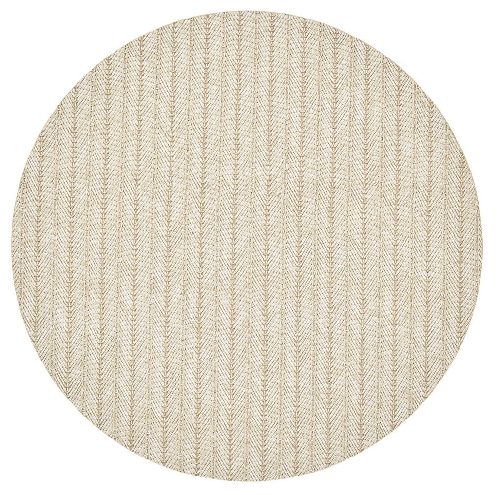 The Kim Seybert Herringbone Placemat features a round beige design with a subtle herringbone pattern and textured polyvinyl surface, ideal for spring and summer dining.