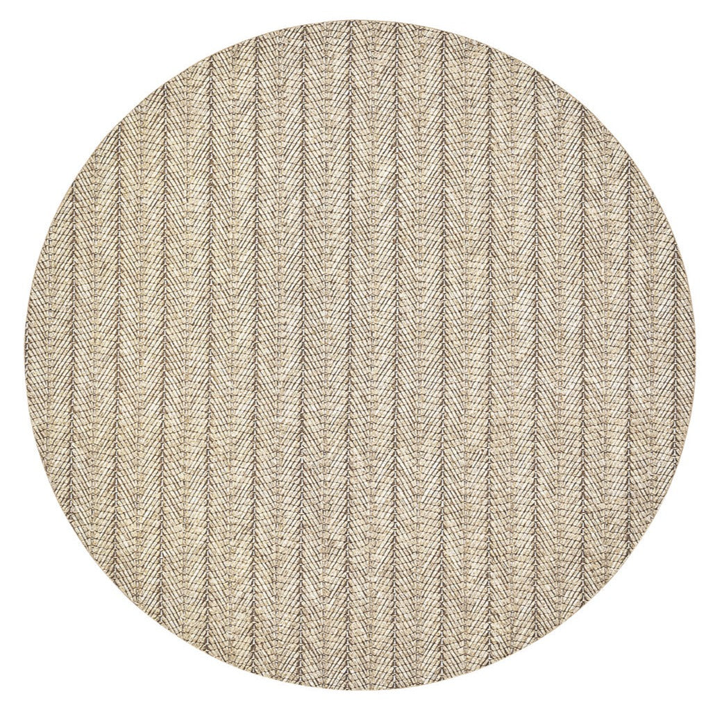 A round beige rug with a subtle herringbone pattern, made from durable polyvinyl for easy care—perfect for spring and summer dining and designed to coordinate with your favorite Kim Seybert Herringbone Placemat.