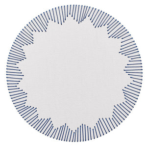 The Kim Seybert Dream Weaver Placemat features a circular white design with a stitched dark blue border and starburst blue radial lines—ideal for adding woven style to summer entertaining.
