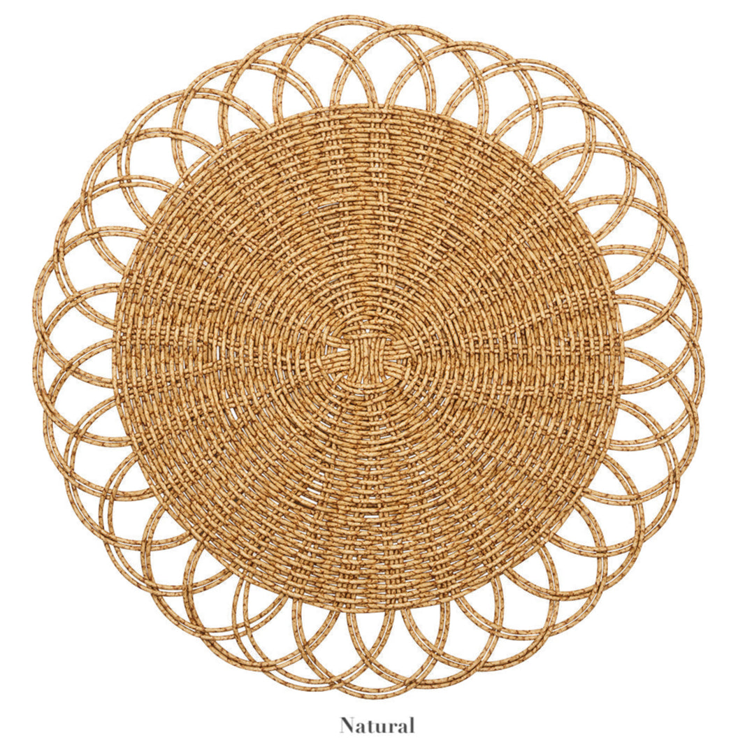 The Kim Seybert Alfresco Placemat is crafted from handwoven faux rattan with scalloped edges and a natural tan hue, adding an elegant, casual touch to your table.