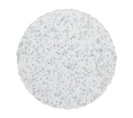 The Kim Seybert Stardust Placemat Collection features round, transparent placemats with scalloped edges and silver speckles, adding handcrafted elegance to any table setting.