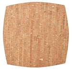 The Kim Seybert Whistler Placemat features a square cork design with rounded edges, a natural speckled pattern, and a light brown hue—ideal for rustic decor and highlighting sustainable craftsmanship.