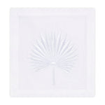 Square white Italian linen Palm Coasters, Set of 4 by Haute Home hand embroidered with a palm leaf design in the center.