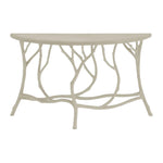 The Hidcote Console Table by Currey and Company features a light-colored, half-moon top with branch-like legs in an organic faux bois design.