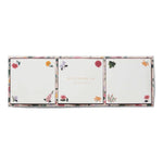A boxed set from Riffle Paper Co.’s Dahlia Collection includes three square notepads featuring elegant floral designs, called the "Notepad Trio.