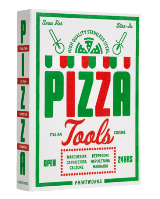 A rectangular box with a retro design labeled "The Essentials Pizza Tools" by PrintWorks, featuring green and red text, pizza graphics, a list of pizza types, and highlighting its high quality stainless steel Pizza Kit.