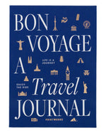 The PrintWorks Bon Voyage Travel Journal features a blue cover with white and gold “Bon Voyage A Travel Journal” text and landmark icons including the Eiffel Tower and Statue of Liberty.
