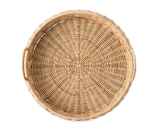The Juliska Provence Rattan Circle Tray is a round, handwoven wicker tray with two side handles, resembling a rattan serving tray. It is shown from above and isolated on a white background.