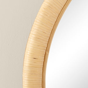 Close-up of the Paloma Small Round Mirror by Selamat, featuring a textured, light rattan frame against a neutral wall for an organic accent in your home decor.