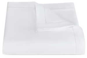 Part of our refined bedding range, the Matouk White Roman Hemstitch Bedding Collection features a folded white sheet with elegant hemstitch detailing on the edges.