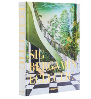 The Sig Bergamin Eclectic book by Assouline features a cover highlighting his iconic creative design, complete with a checkered floor, spiral staircase, and lush greenery.