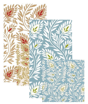 The Caspari Samsara Collection features four eco-friendly, FSC-certified rectangular napkins: two white with red and tan, and two blue with green and white, each adorned with leaf and flower patterns.