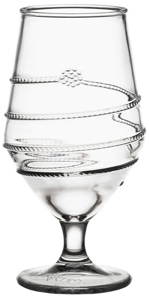 An empty, decorative Juliska Amalia Clear Acrylic drinkware with spiraling designs on the surface.