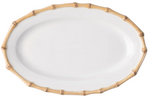 The Juliska Classic Bamboo Medium Platter is an oval white serving piece with a bamboo-style rim—ideal for presenting cuisine at dinner parties.