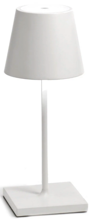 The Poldina Pro Mini Table Lamp Collection by Zafferano America features a modern white design with a square base, slim vertical stem, and conical shade, providing cordless lighting for versatile use indoors or outdoors.
