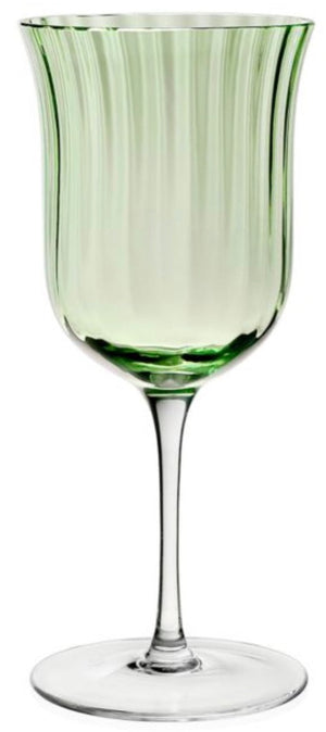 A tall, clear lime green water goblet from the Corinne Green Collection by William Yeoward Crystal, featuring a fluted bowl, long stem, and round base, stands upright against a white background.