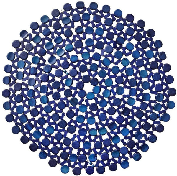 Round blue area rug made of scattered, varying shades of blue circles interconnected in a grid-like pattern, resembling a Kim Seybert Bamboo Round Placemat effect.