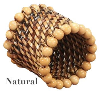 The Calaisio Woven Napkin Ring features a natural brown pattern, handmade from South Pacific water-vines and accented with round wooden beads along the edges.