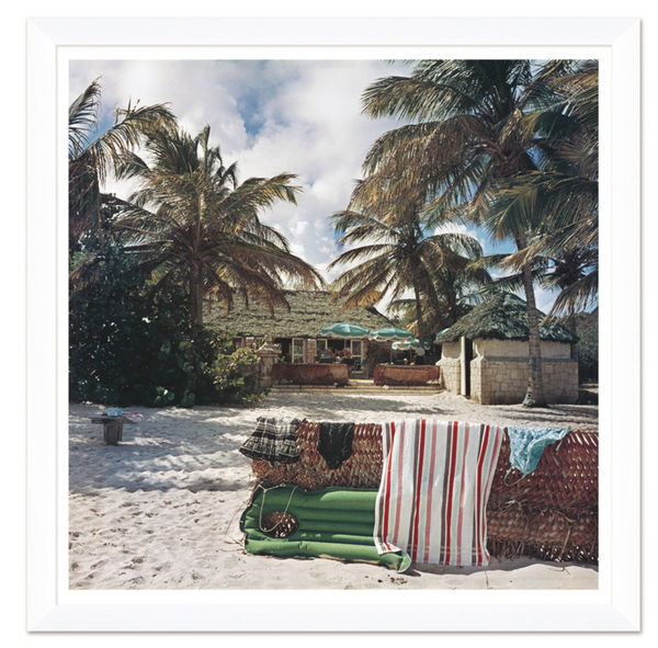 A framed photograph of "Antigua Beach Club" from the Slim Aarons By Getty Images Gallery, January 1, 1960 by Soicher Marin.