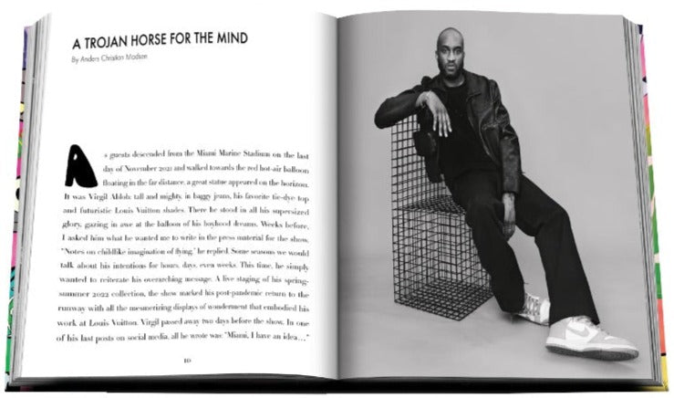 Open Assouline magazine featuring an article titled "a trojan horse for the mind" with a black and white photograph of a seated man, identified as fashion designer Virgil Abloh, wearing Louis Vuitton: Virgil Abloh (Classic Cartoon Cover)