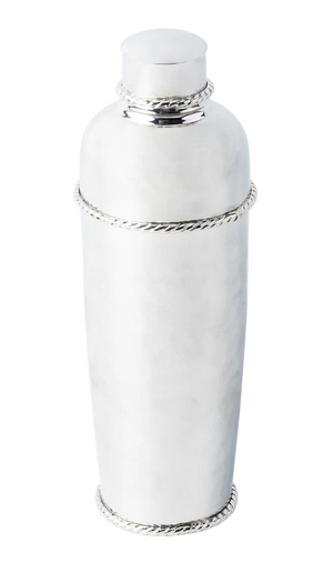 The Juliska Graham Barware Collection features a stainless steel cocktail shaker with a handmade hammered finish, rounded cap, and rope-like trim at the top, middle, and base.