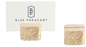 Two Zachary Gold Place Card Holders from Blue Pheasant are shown, textured and gold-toned, displayed with a branded card in a sleek holder.