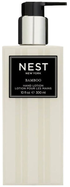 A bottle of NEST Bamboo Hand Lotion with natural botanicals on a white background.