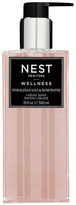 A rectangular bottle of Nest Himalayan Salt & Rosewater Liquid Soap features a pump dispenser and a sleek black and white label, with notes of geranium and rosewater.