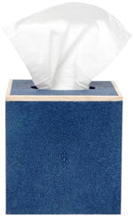 The Manchester Bath Collection by Pigeon & Poodle features a blue shagreen-textured tissue box with a single white tissue emerging from the top.