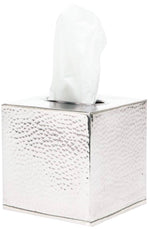 The Verum Bath Collection by Pigeon & Poodle features a hand-hammered silver tissue box with a textured finish and crisp white tissue visible at the top.