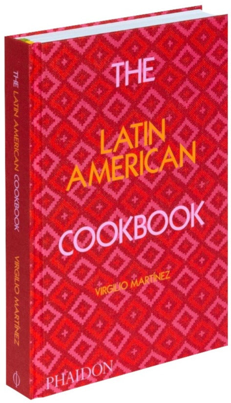 The Latin American Cookbook by Virgilio Martínez, published by Phaidon, features a red patterned cover and is filled with traditional recipes celebrating Latin American cuisine.
