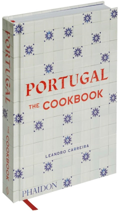 The cover of "Portugal: The Cookbook" by Leandro Carreira, a Portuguese cookbook from Phaidon, features a tiled pattern with blue floral motifs and red text. Immerse in Portuguese cuisine with traditional recipes.
