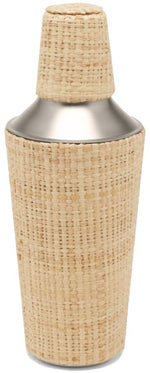 The Blue Pheasant Barth Natural Gold Raffia Cocktail Shaker features a stainless steel body with a woven raffia sleeve and lid, shown against a white background. Perfect for patio entertaining.